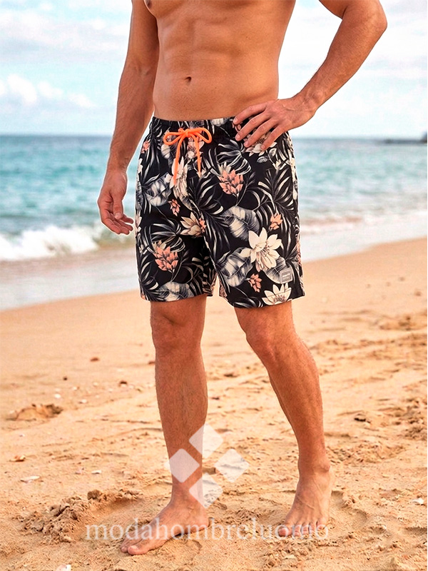 bañador-hombre-estampado-tropical-gravik-1 hombre con bañador con dibujo tropical secado rapido