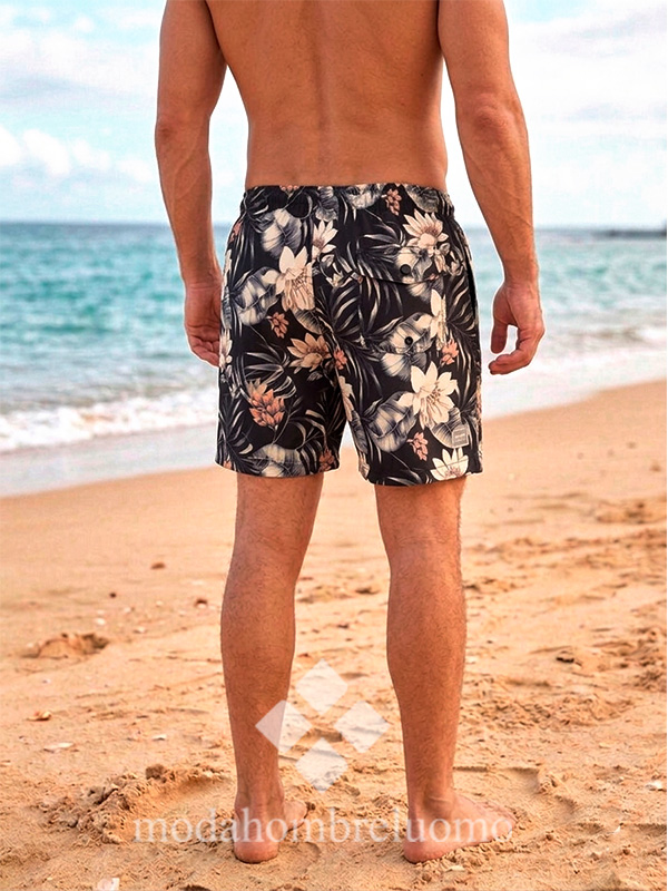 bañador-hombre-estampado-tropical-gravik-2 hombre con bañador con dibujo tropical secado rapido